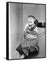 Monkey in Clothing Holds Phone Receiver-null-Framed Stretched Canvas