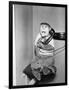 Monkey in Clothing Holds Phone Receiver-null-Framed Photographic Print