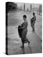 Monks Begging For Food at Dawn on Main Thoroughfare of Bangkok-Howard Sochurek-Stretched Canvas