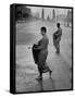 Monks Begging For Food at Dawn on Main Thoroughfare of Bangkok-Howard Sochurek-Framed Stretched Canvas