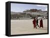 Monks Carrying Umbrellas to Shield Against the Sun, in Front of the Potala Palace, Tibet-Don Smith-Framed Stretched Canvas