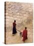 Monks Carrying Yak Butter, Ganden Monastery, Tagtse County, Tibet-Michele Falzone-Stretched Canvas