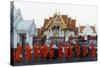Monks Collecting Morning Alms, the Marble Temple (Wat Benchamabophit), Bangkok, Thailand-Christian Kober-Stretched Canvas