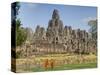 Monks Looking at Bayon Temple, Angkor, Siem Reap, Cambodia-null-Stretched Canvas