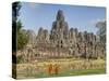 Monks Looking at Bayon Temple, Angkor, Siem Reap, Cambodia-null-Stretched Canvas