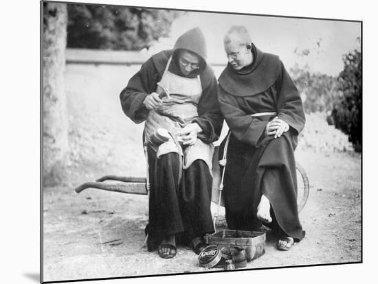 Monks Mending Sandals-null-Mounted Photographic Print