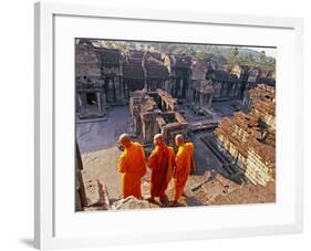 Monks Overlook Angkor Wat, Cambodia-Tom Haseltine-Framed Photographic Print