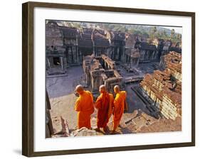 Monks Overlook Angkor Wat, Cambodia-Tom Haseltine-Framed Photographic Print