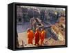 Monks Overlook Angkor Wat, Cambodia-Tom Haseltine-Framed Stretched Canvas