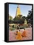 Monks Praying at the Buddhist Mahabodhi Temple, a UNESCO World Heritage Site, in Bodhgaya, India-Mauricio Abreu-Framed Stretched Canvas