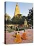 Monks Praying at the Buddhist Mahabodhi Temple, a UNESCO World Heritage Site, in Bodhgaya, India-Mauricio Abreu-Stretched Canvas