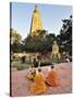 Monks Praying at the Buddhist Mahabodhi Temple, a UNESCO World Heritage Site, in Bodhgaya, India-Mauricio Abreu-Stretched Canvas