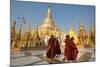 Monks walk around Shwedagon Pagoda, Yangon (Rangoon), Myanmar (Burma), Asia-Alex Treadway-Mounted Photographic Print
