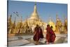 Monks walk around Shwedagon Pagoda, Yangon (Rangoon), Myanmar (Burma), Asia-Alex Treadway-Stretched Canvas