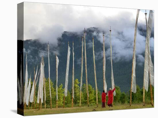 Monks with Praying Flags, Phobjikha Valley, Gangtey Village, Bhutan-Keren Su-Stretched Canvas