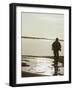 Monochromatic Image of a Cyclist on the Beach-null-Framed Photographic Print