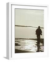 Monochromatic Image of a Cyclist on the Beach-null-Framed Photographic Print