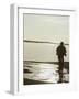 Monochromatic Image of a Cyclist on the Beach-null-Framed Photographic Print