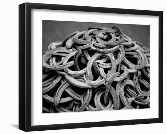 Monochromatic Image of a Pile of Horseshoes-null-Framed Photographic Print