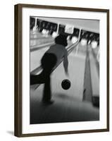 Monochromatic Image of a Woman Bowling-null-Framed Photographic Print