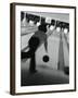 Monochromatic Image of a Woman Bowling-null-Framed Photographic Print