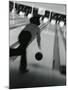 Monochromatic Image of a Woman Bowling-null-Mounted Photographic Print