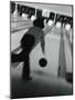 Monochromatic Image of a Woman Bowling-null-Mounted Photographic Print