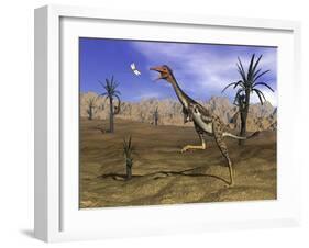 Mononykus Dinosaur Chasing a Dragonfly in the Desert-Stocktrek Images-Framed Art Print