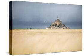 Mont Saint Michel under grey sky-Philippe Manguin-Stretched Canvas