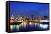 Montreal over River at Dusk with City Lights and Urban Buildings-Songquan Deng-Framed Stretched Canvas