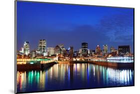 Montreal over River at Dusk with City Lights and Urban Buildings-Songquan Deng-Mounted Photographic Print