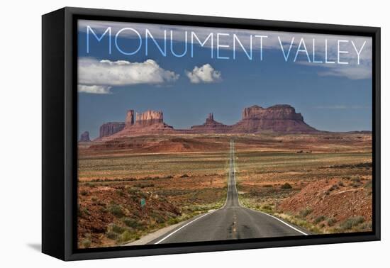 Monument Valley, Utah - Road into Distance-Lantern Press-Framed Stretched Canvas