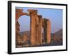 Monumental Arch at Archaeological Site, with Arab Castle Beyond, Palmyra, Syria-Bruno Morandi-Framed Photographic Print