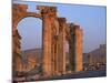 Monumental Arch at Archaeological Site, with Arab Castle Beyond, Palmyra, Syria-Bruno Morandi-Mounted Photographic Print