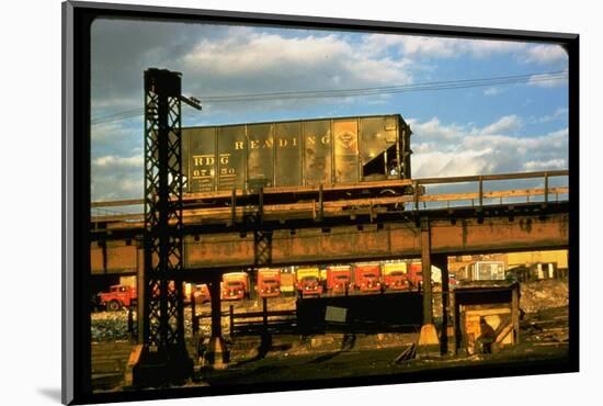 Moody Sunlight Showing Hopper Car of the Reading Railroad Idle on Rusting Elevated Span-Walker Evans-Mounted Photographic Print