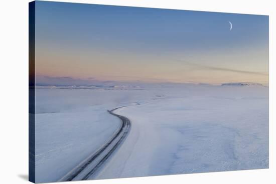 Moon and snowy mountain road, Iceland-Panoramic Images-Stretched Canvas