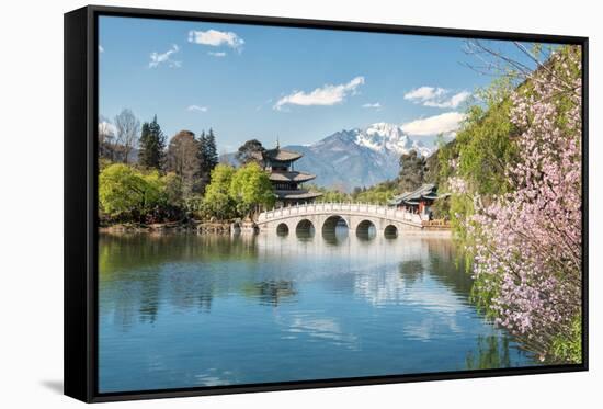 Moon Embracing Pavilion and Suocui Bridge at Black Dragon Pool in Jade Spring Park, Lijiang, Yunnan-Andreas Brandl-Framed Stretched Canvas