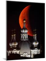 Moon is Seen Rising in the Sky Above the Domes of the Smolny Cathedral in St.Petersburg, Russia-null-Mounted Photographic Print