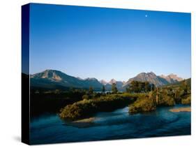 Moon over St. Mary River and Mountains,Glacier National Park, Montana, USA-John Reddy-Stretched Canvas