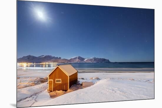 Moonlight on a Typical Fishermen Cabin Surrounded by Snow, Ramberg, Flakstad-Roberto Moiola-Mounted Premium Photographic Print