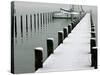 Moored Boats and a Dock are Covered by Overnight Snow at Lake Chiemsee-null-Stretched Canvas