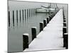 Moored Boats and a Dock are Covered by Overnight Snow at Lake Chiemsee-null-Mounted Photographic Print