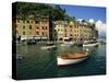 Moored Boats and Architecture of Portofino, Liguria, Italy, Mediterranean, Europe-Howell Michael-Stretched Canvas