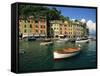 Moored Boats and Architecture of Portofino, Liguria, Italy, Mediterranean, Europe-Howell Michael-Framed Stretched Canvas