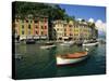 Moored Boats and Architecture of Portofino, Liguria, Italy, Mediterranean, Europe-Howell Michael-Stretched Canvas