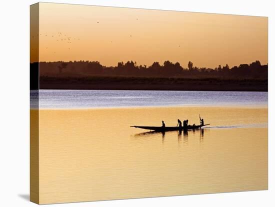 Mopti, at Sunset, a Boatman in a Pirogue Ferries Passengers across the Niger River to Mopti, Mali-Nigel Pavitt-Stretched Canvas