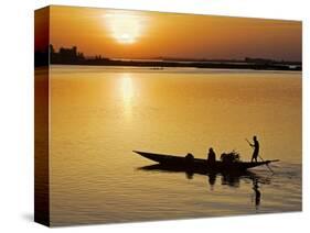 Mopti, at Sunset, a Boatman in a Pirogue Ferries Passengers across the Niger River to Mopti, Mali-Nigel Pavitt-Stretched Canvas