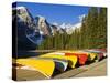 Moraine Lake and Rental Canoes Stacked, Banff National Park, Alberta, Canada-Larry Ditto-Stretched Canvas