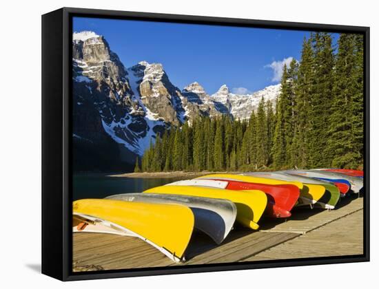 Moraine Lake and Rental Canoes Stacked, Banff National Park, Alberta, Canada-Larry Ditto-Framed Stretched Canvas