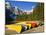 Moraine Lake and Rental Canoes Stacked, Banff National Park, Alberta, Canada-Larry Ditto-Mounted Photographic Print